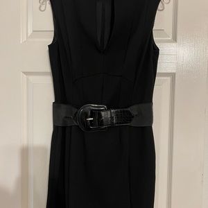 Black sleeveless v-neck fitted dress. White House Black Market.